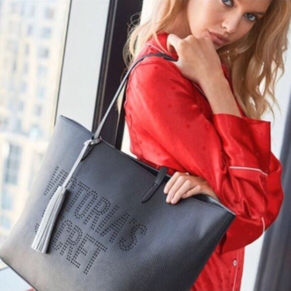 Victoria's Secret Handbags - Victoria's Secret Black Faux Leather Tote with Tassel Charm